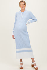 woman wearing a light blue striped maternity dress with a collared neckline and long sleeves, showing her baby bump