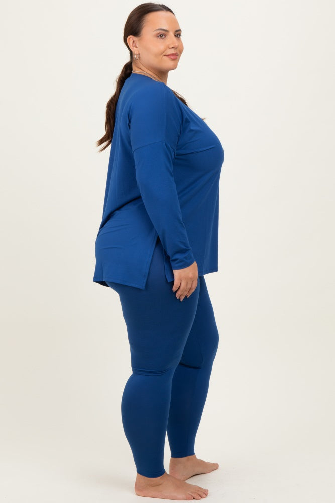 woman wearing a blue long sleeve top and matching leggings in a plus size fit