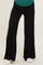 woman wearing black maternity wide-leg pants with a comfortable waistband and relaxed fit