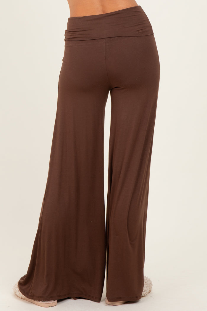 woman wearing brown wide-leg lounge pants, back view