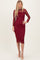 woman wearing a burgundy long sleeve midi dress with mesh overlay and glitter details