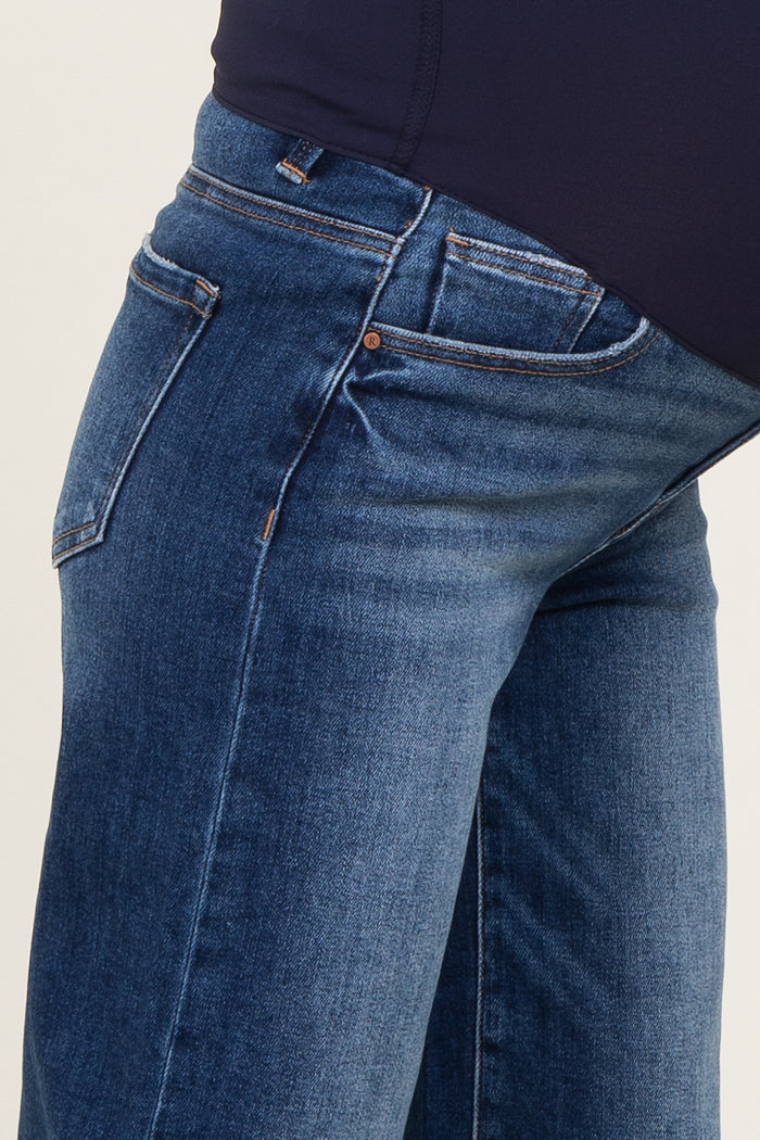 blue maternity jeans with a relaxed fit, featuring a comfortable waistband for a growing baby bump