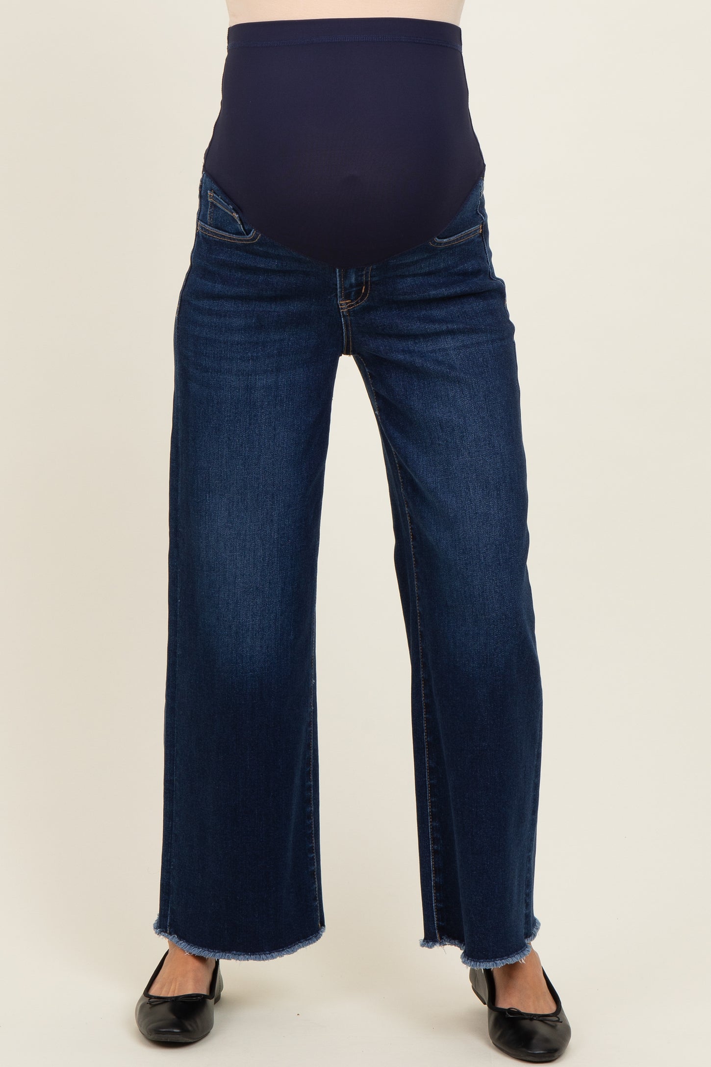 maternity wear dark blue wide-leg jeans with a supportive over-the-bump waistband