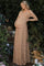 woman wearing a beige lace off-the-shoulder maternity gown highlighting her baby bump