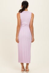 woman wearing a light purple ribbed midi dress with a sleeveless design and back view visible