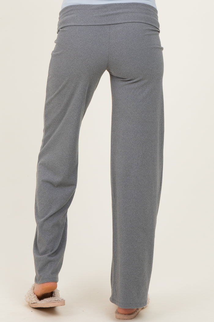 woman wearing gray maternity lounge pants, view from the back