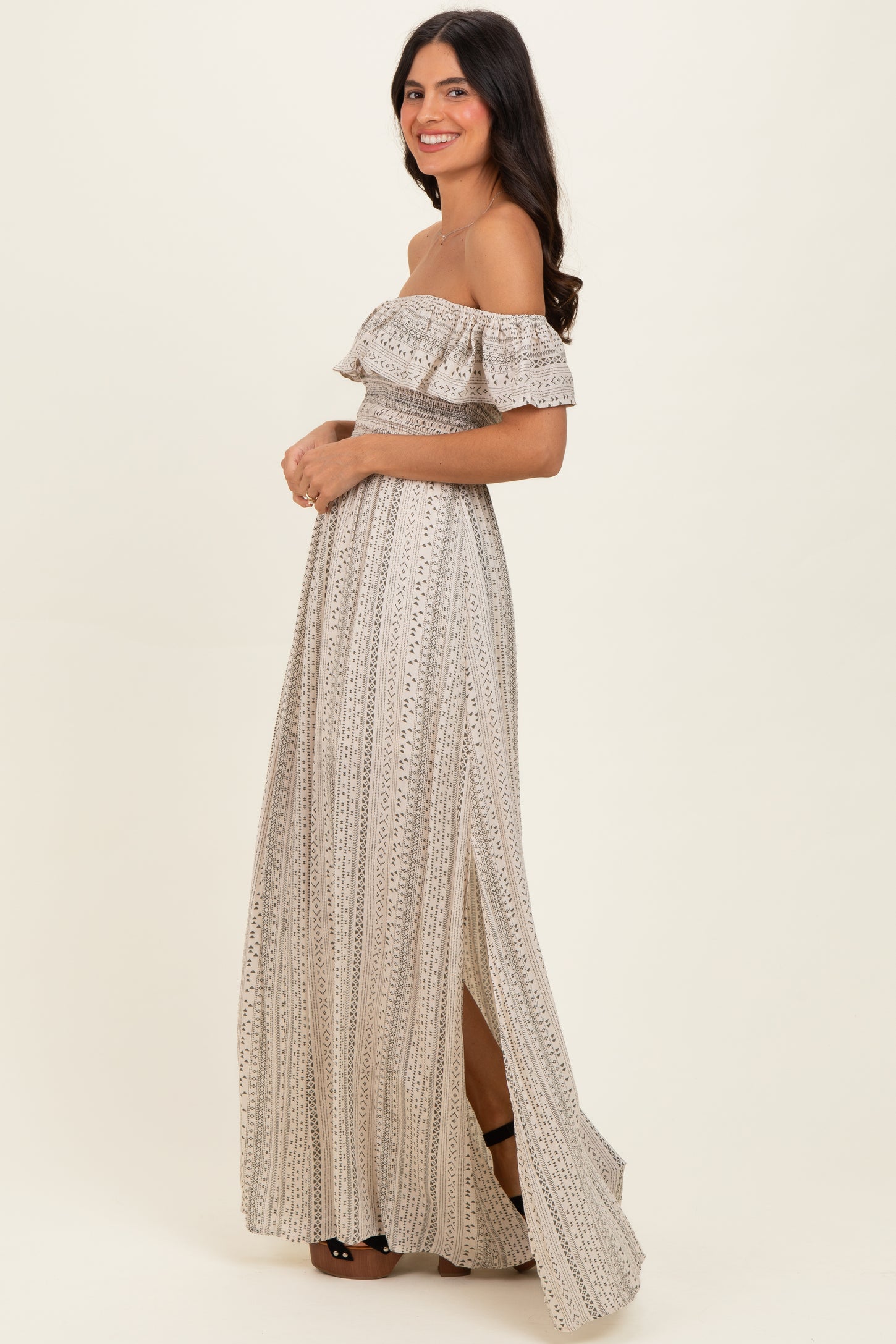 beige ruffle dress Tiered Polka Dot Charmeuse Gown Model is 510 and 1/2 and 1/2 and wears a size 4 Beige Ruffle Off Shoulder Maternity