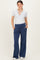 woman wearing a gray short sleeve henley top and navy blue maternity sweatpants with pockets