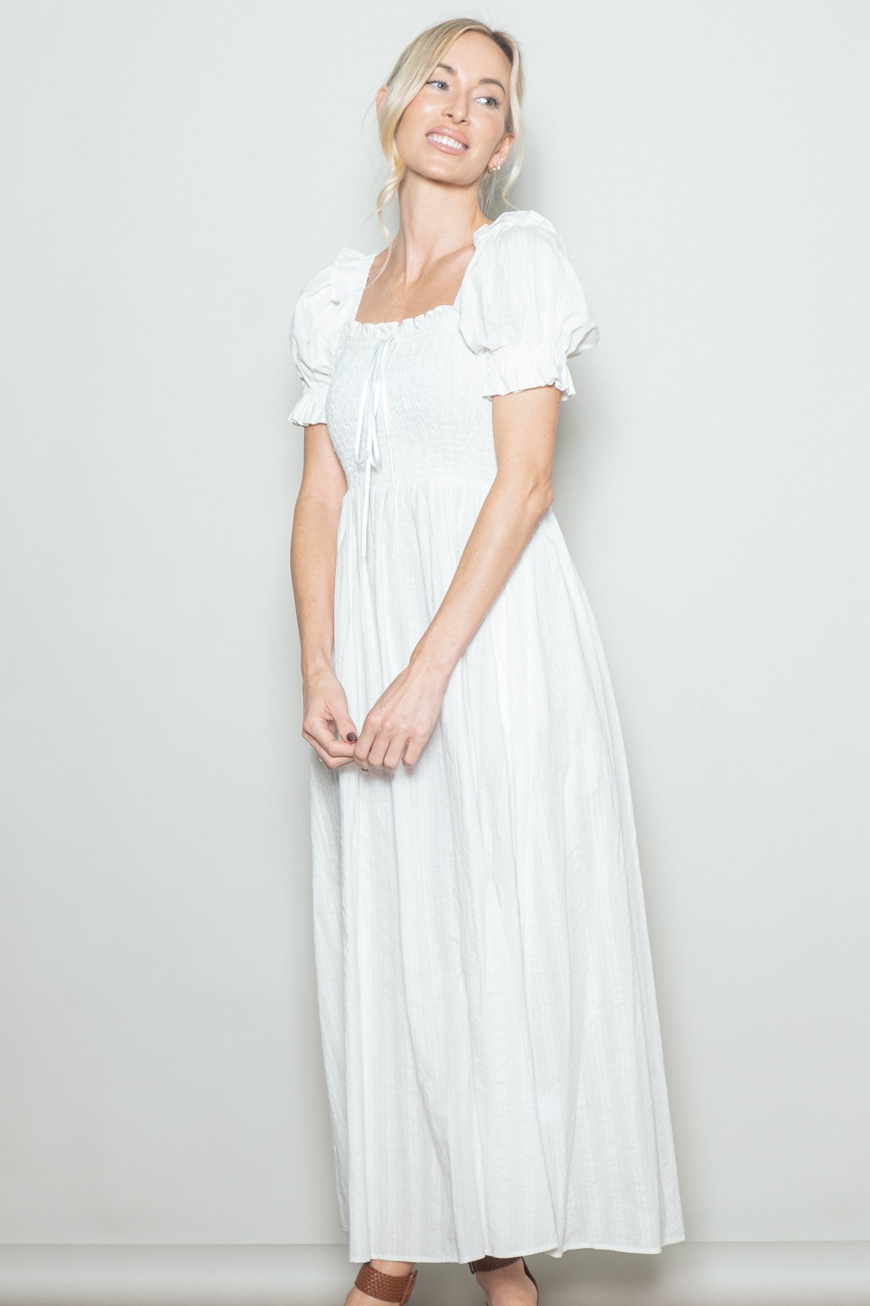 White Smocked Ruffle Accent Ribbon Tie Maternity Maxi Dress