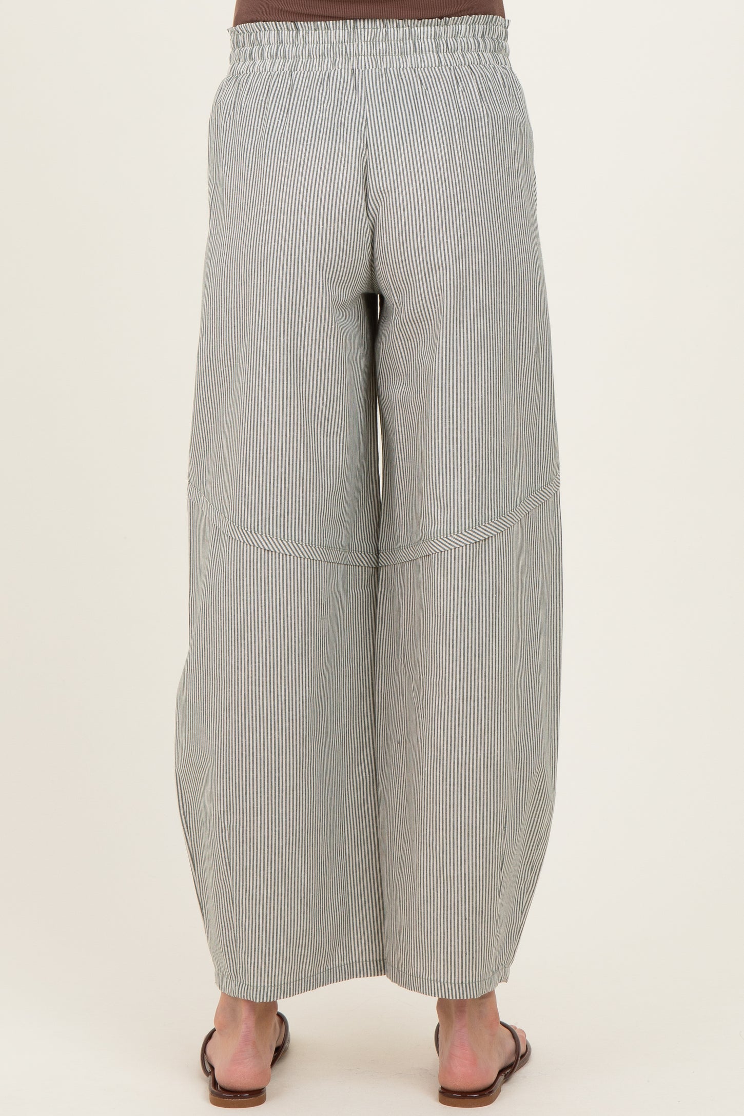 maternity wear wide-leg striped pants with a relaxed fit, shown from the back