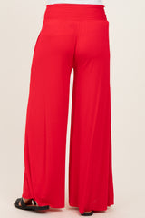 red wide-leg maternity pants with a stretchy waistband, viewed from the back