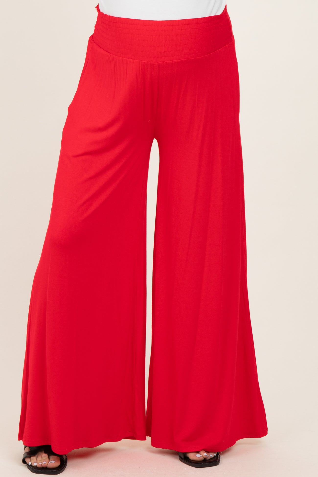 maternity wear in bright red wide leg pants with a comfy elastic waistband