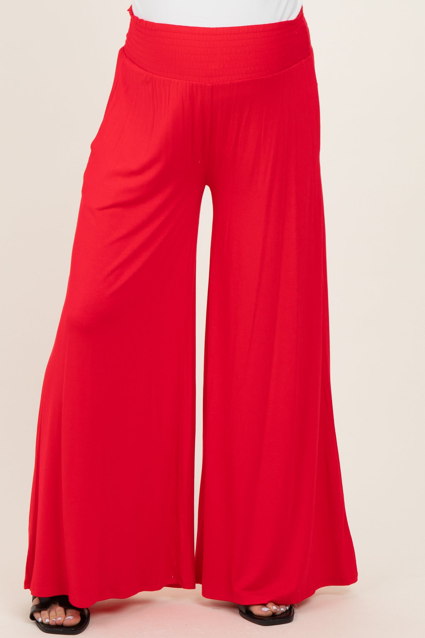 maternity wear in bright red wide leg pants with a comfy elastic waistband
