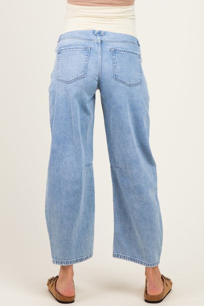 woman wearing light blue maternity wide-leg jeans from the back, featuring a comfortable waistband and relaxed fit