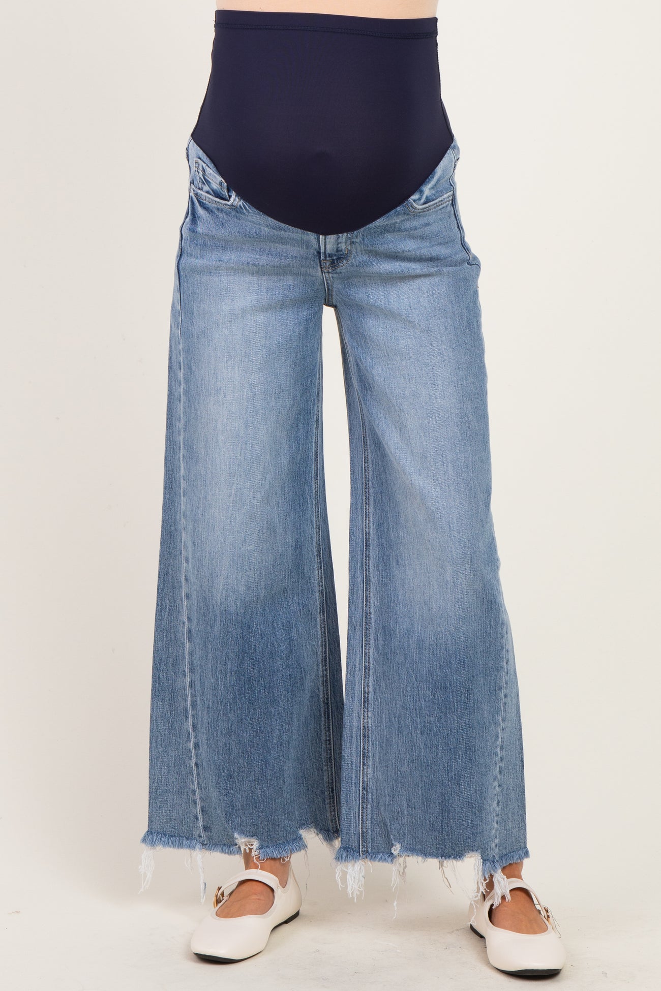 maternity wear featuring wide-leg distressed light blue jeans with a navy high-waisted panel for support