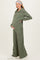 woman wearing a green ribbed maternity loungewear set with a zip-up hoodie and wide-leg pants, showing her baby bump