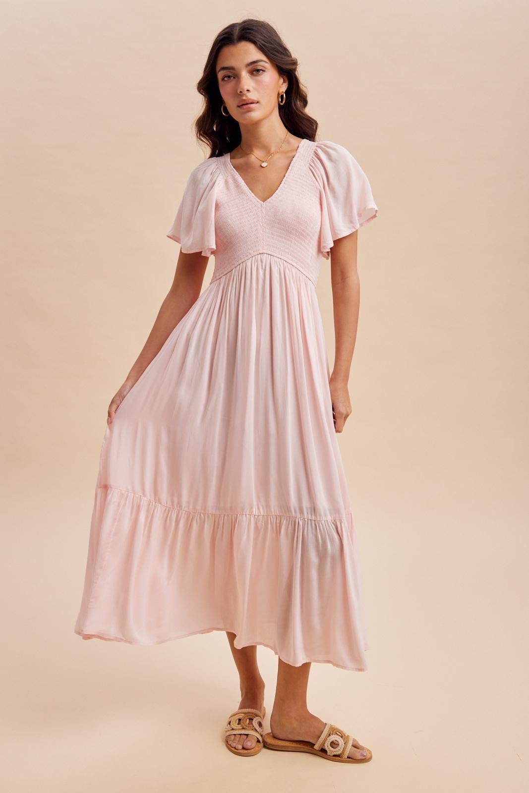 pink smock midi dress The Bryan Smocked Midi Dress in Pale Pink Large