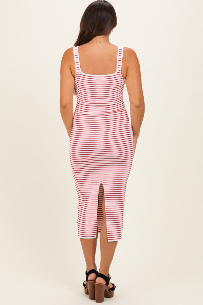 woman wearing a red and white striped maternity midi dress with a back slit, showing a baby bump