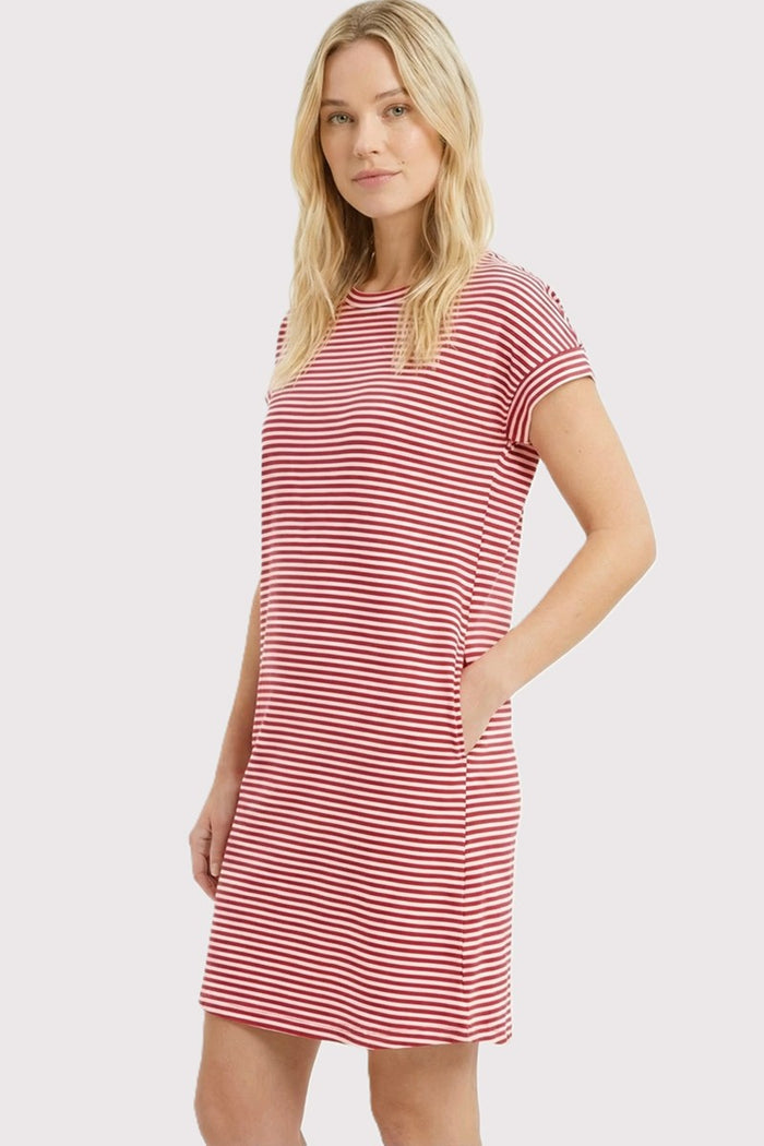 woman wearing a red and white striped short sleeve dress with pockets