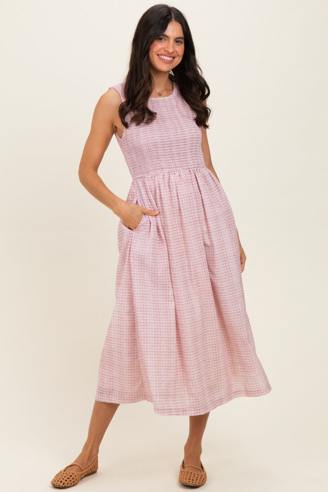 sleeveless smocked midi dress Blush Gingham Sleeveless Smocked Midi Dress