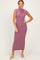woman wearing a sleeveless ribbed midi dress in mauve with a mock neckline and side slit