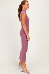 woman wearing a sleeveless ribbed midi dress in lavender with a fitted silhouette and side slit