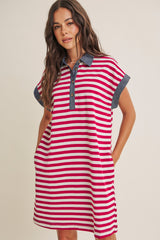 woman wearing a red and white striped short sleeve dress with a denim collar and pockets