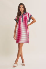 woman wearing a red and white striped polo dress with denim details and short sleeves