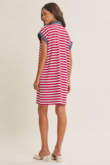 woman wearing a red and white striped short sleeve dress with a denim collar