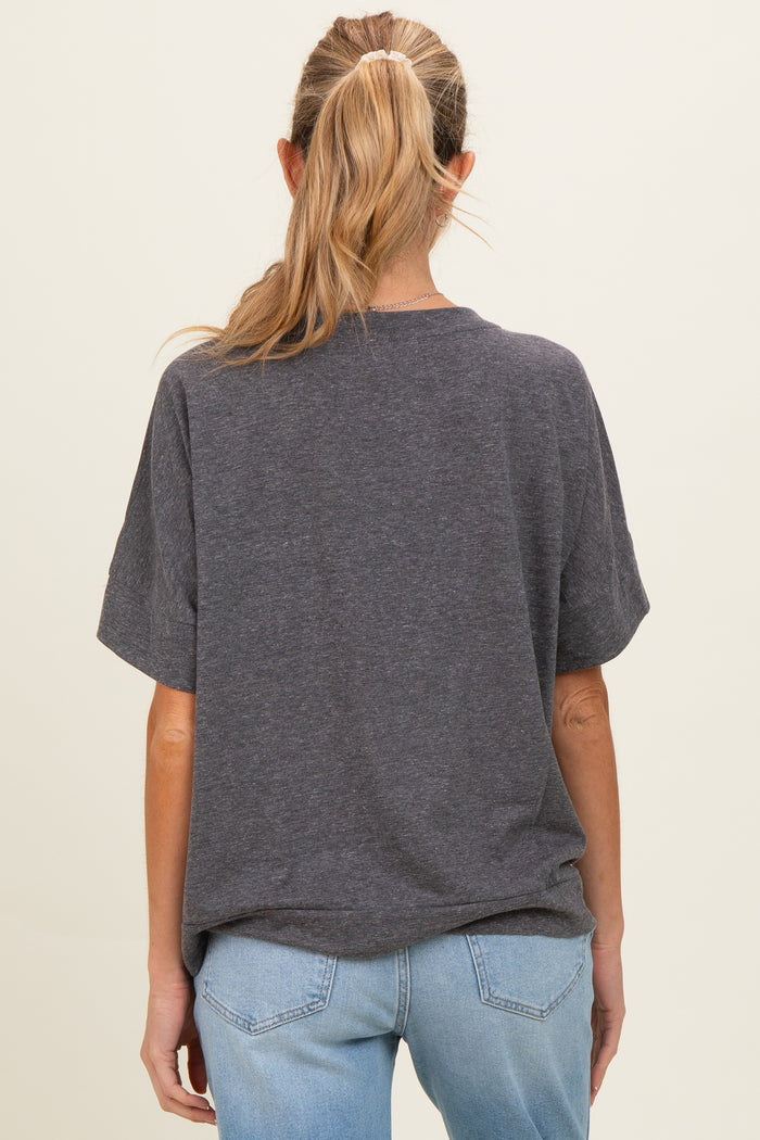 woman wearing a gray short sleeve maternity t-shirt with a relaxed fit, view from the back