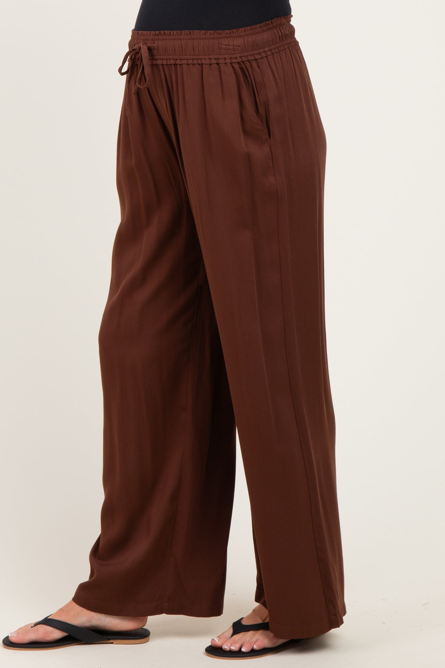 maternity wear brown wide-leg pants with an elastic waistband and drawstring detail