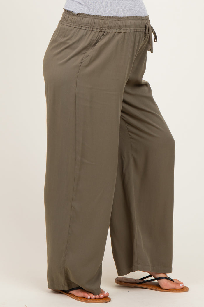 maternity wear olive green wide-leg pants with an elastic waistband, model showing a visible baby bump