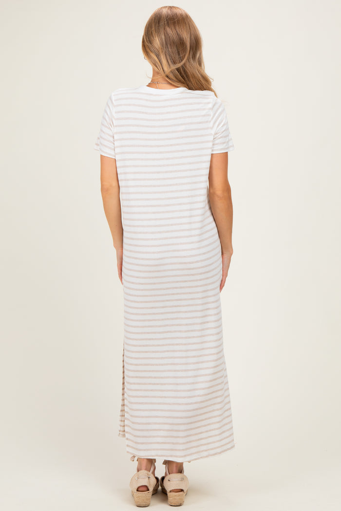 woman wearing a striped maxi dress with short sleeves and a side slit, viewed from the back