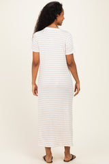 woman wearing a striped white and beige maternity maxi dress, showing a relaxed fit from the back