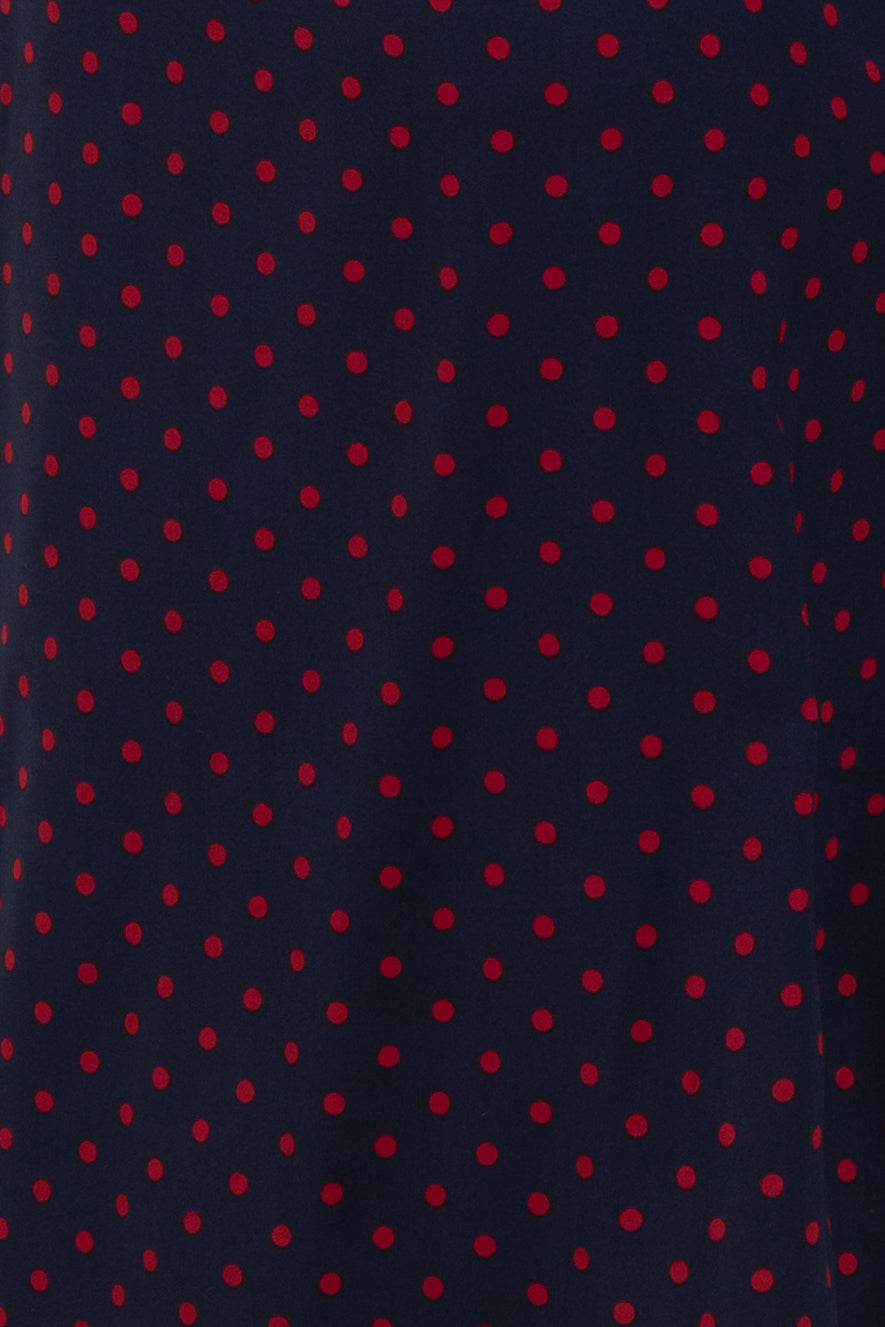 navy blue fabric with red polka dots pattern