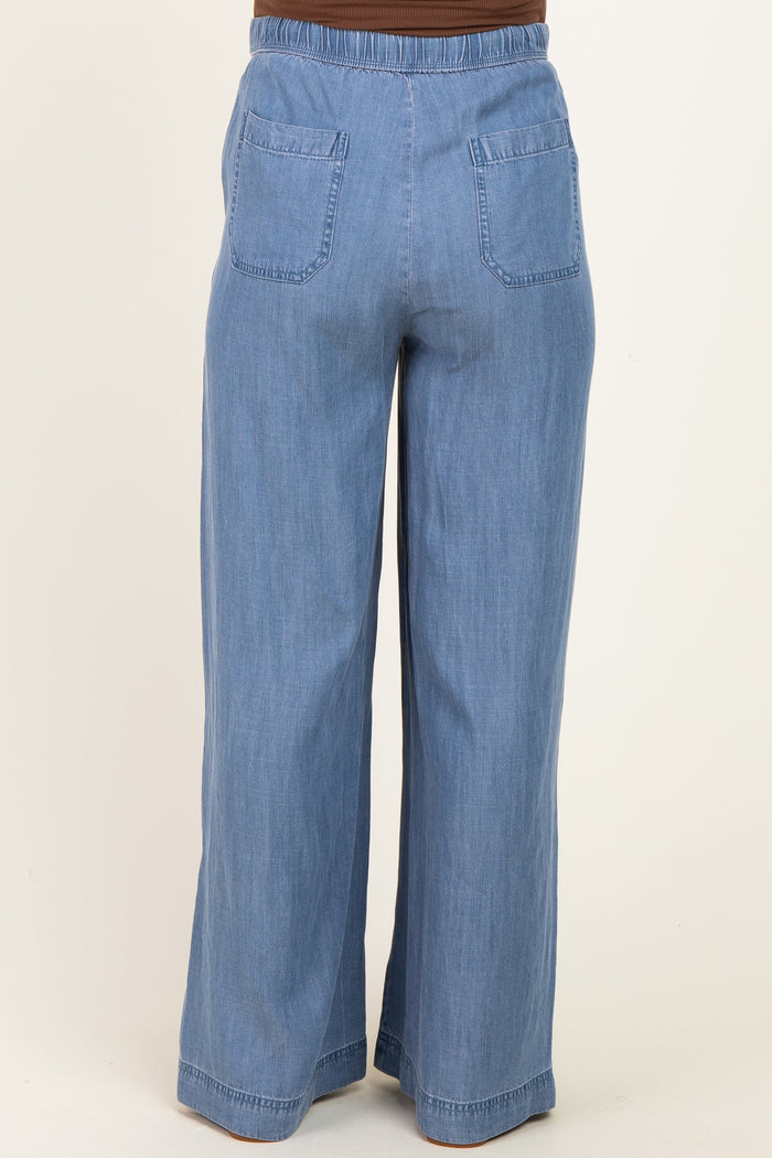 maternity wear light blue wide leg pants with an elastic waistband and back pockets, shown from the back