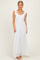woman wearing a white lace maxi dress with cap sleeves and a plunging neckline