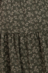 maternity wear in dark green with small floral print and tiered ruffle detailing