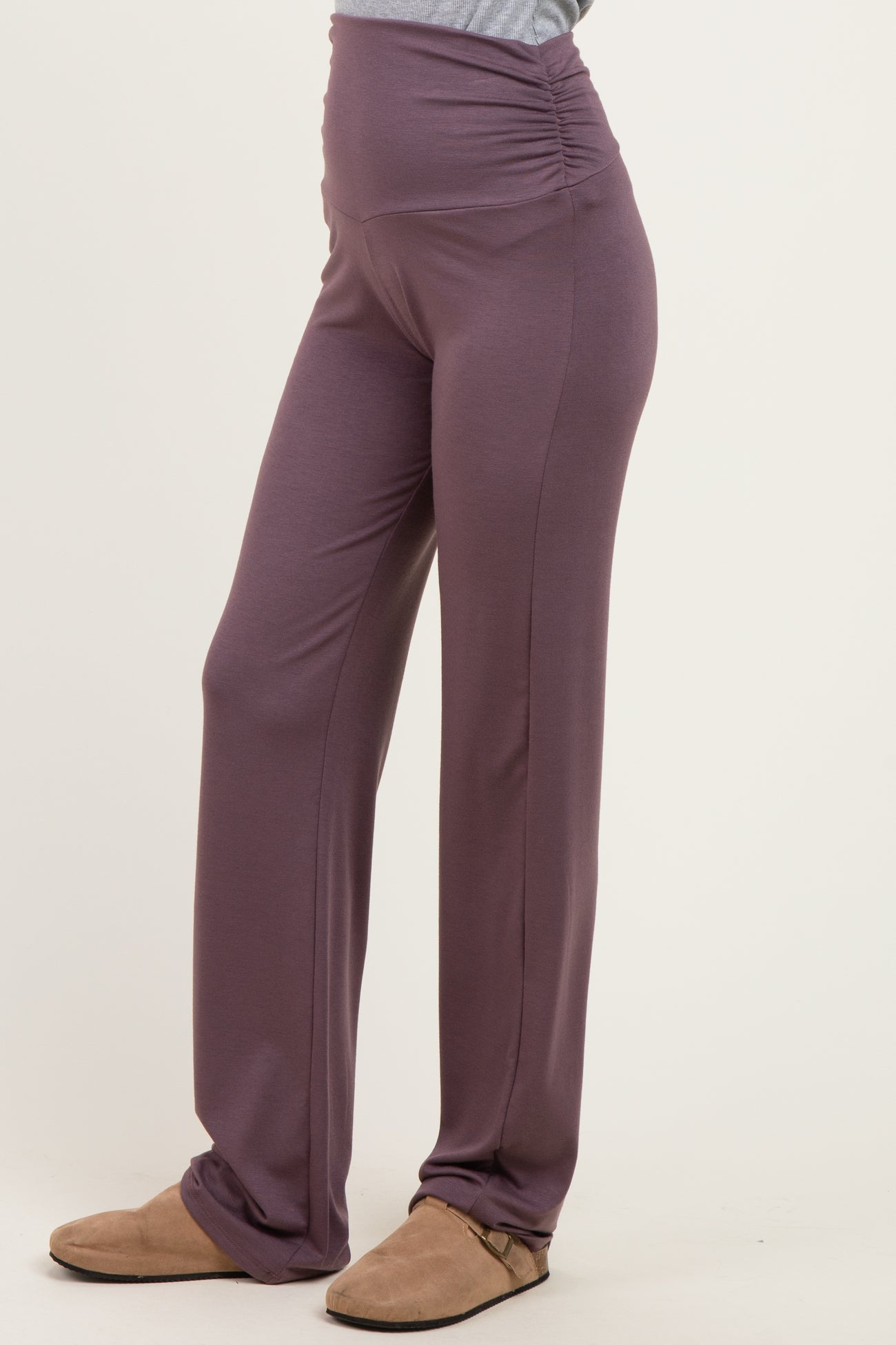woman wearing purple wide-leg pants with a ruched waistband