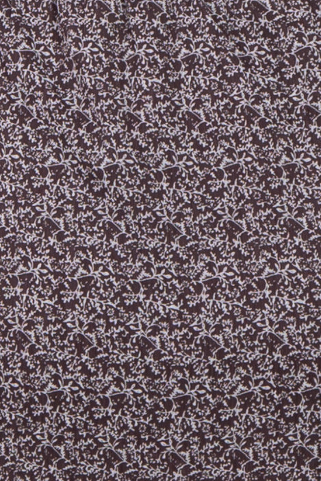 dark purple maternity dress with white floral print throughout
