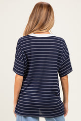 maternity wear in navy and white striped tee with a relaxed fit, model showing the back view