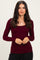 woman wearing a burgundy long sleeve ribbed top with a square neckline