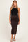woman wearing a black sleeveless top and a brown ribbed midi maternity skirt