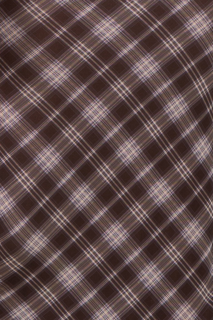 brown plaid fabric with diagonal lines and light purple accents
