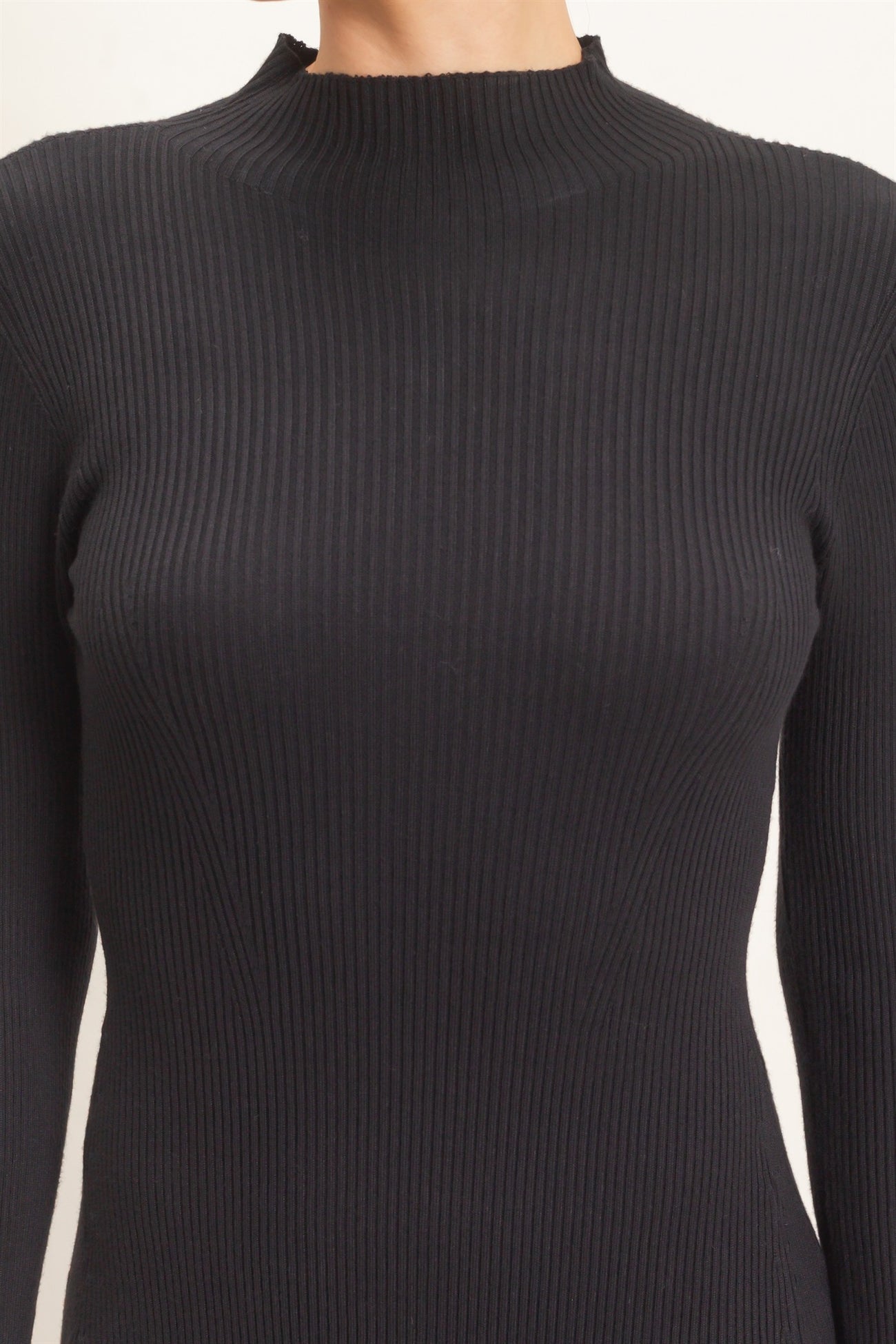 black ribbed long sleeve top with a mock neck design