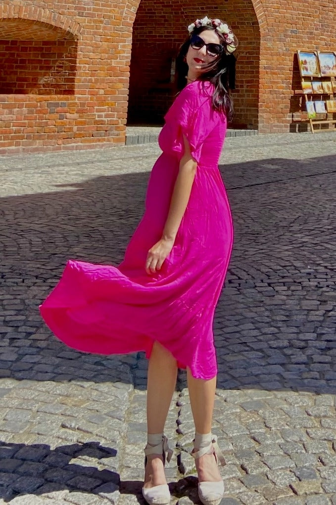 pink smocked ruffle dress THE DULCE TIERED SMOCKED RUFFLE DRESS IN PINK Large