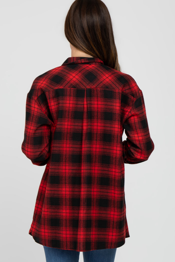 woman wearing a red and black plaid flannel shirt, shown from the back, with long sleeves and a relaxed fit