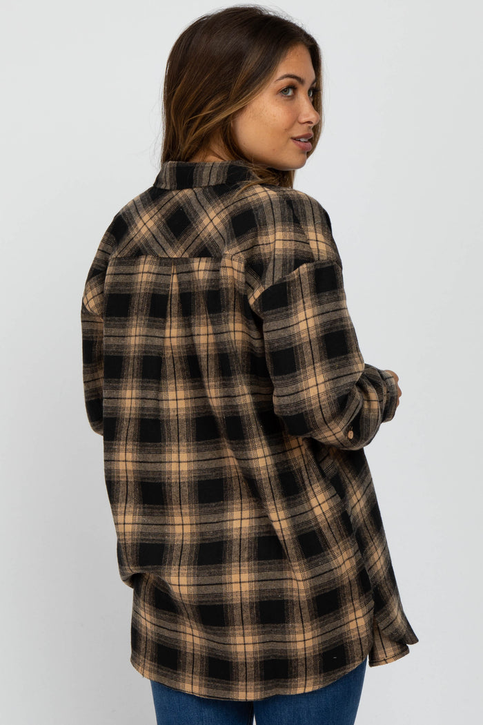 woman wearing a brown and black plaid maternity flannel shirt with a relaxed fit, showing the back view