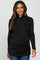 woman wearing a dark grey maternity wrap top with a ruched hem and long sleeves