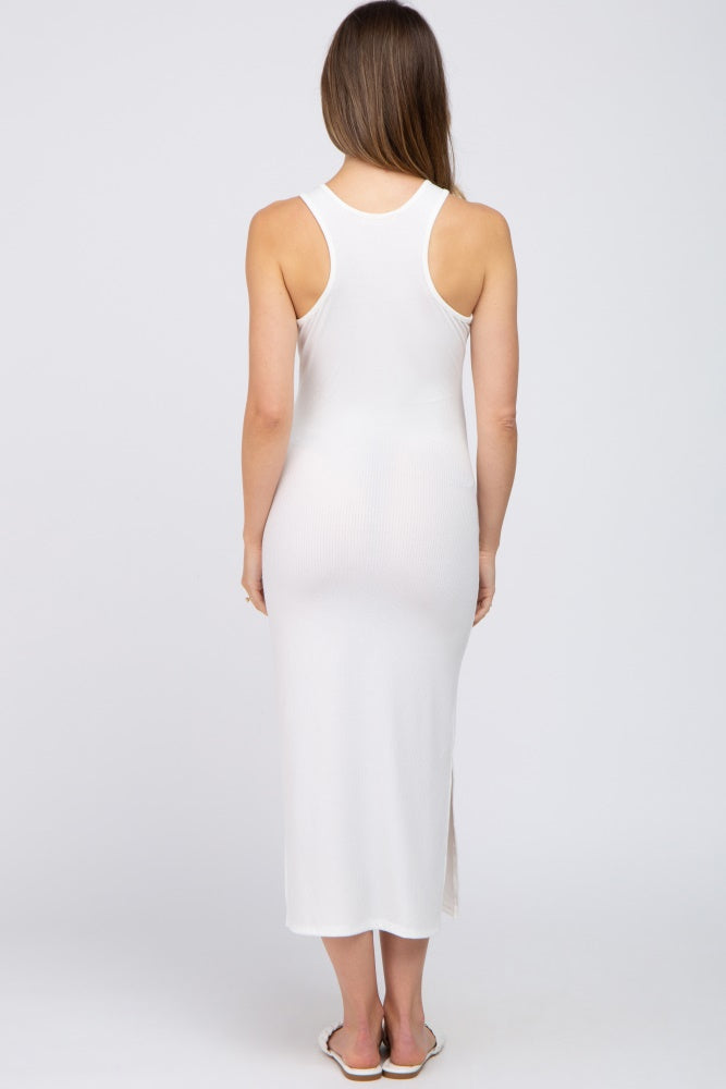 woman wearing a white ribbed maternity maxi dress with side slits, showing a smooth fit from the back